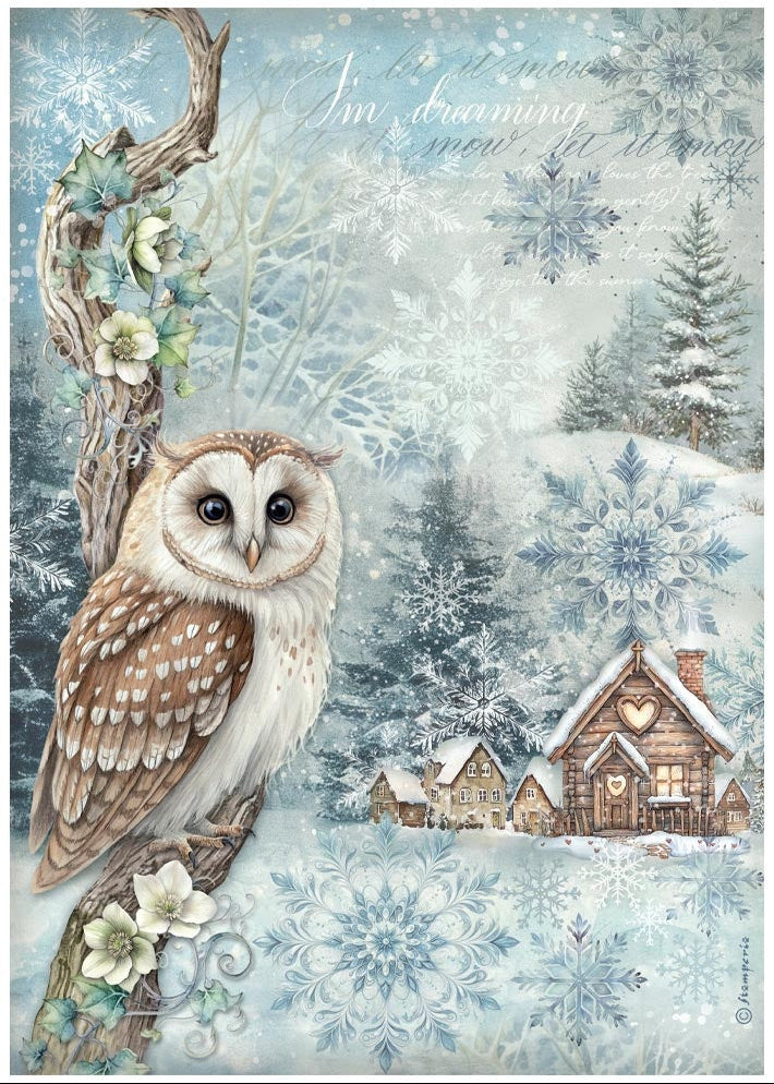 Winter scene with an owl, snowflakes, and a small house in a forest.