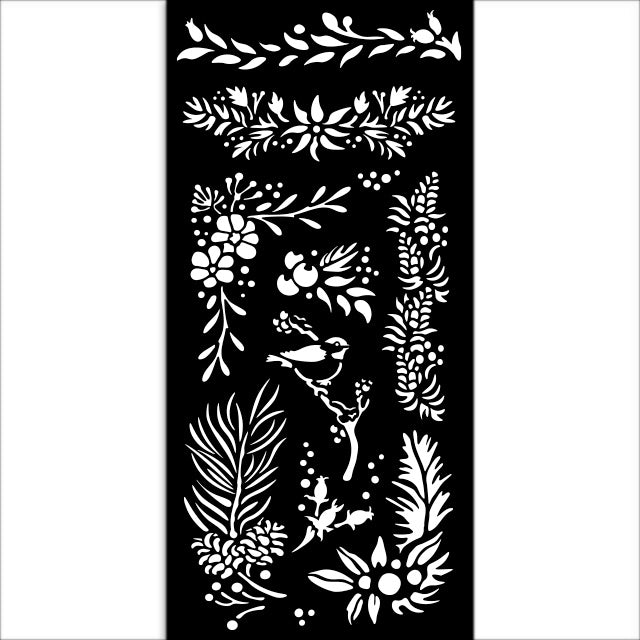 Decorative stencil with white floral and leaf patterns on a black background