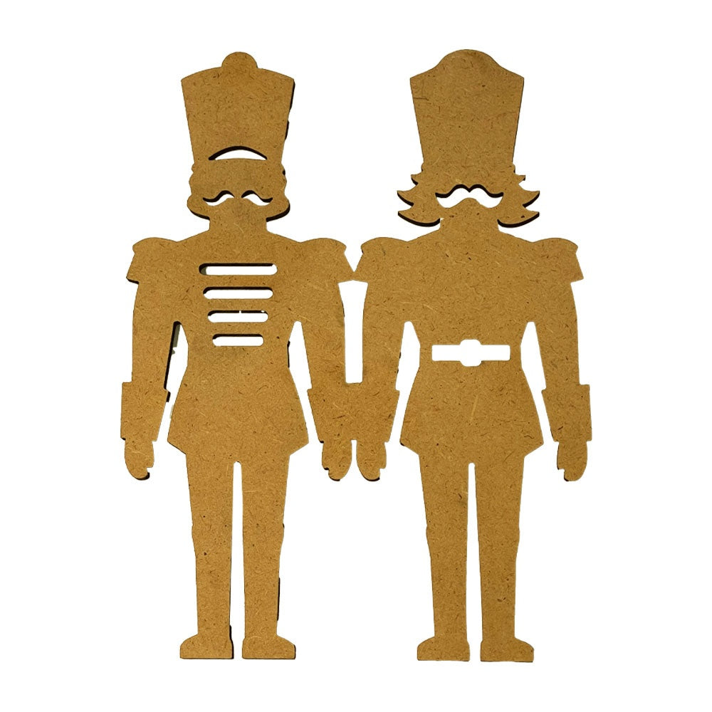 Two MDF wood cutouts of toy soldiers on a white background