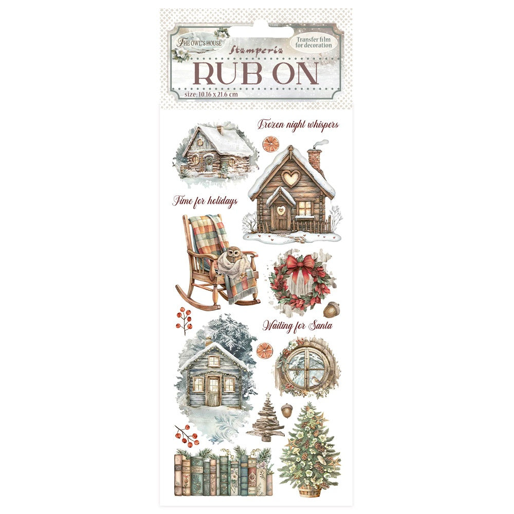 Rub-on transfers with winter-themed designs featuring houses, trees, and festive elements on a white background.