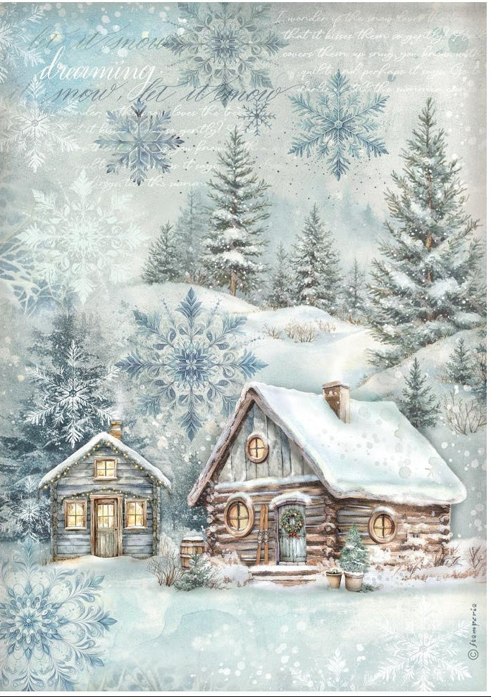 Winter scene with snow-covered houses and trees, featuring a snowy landscape.