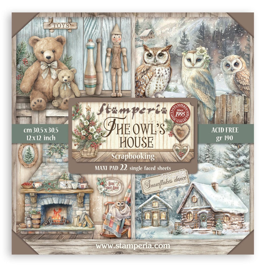 Scrapbooking paper pad with winter-themed design featuring owls, bears, and a cabin.