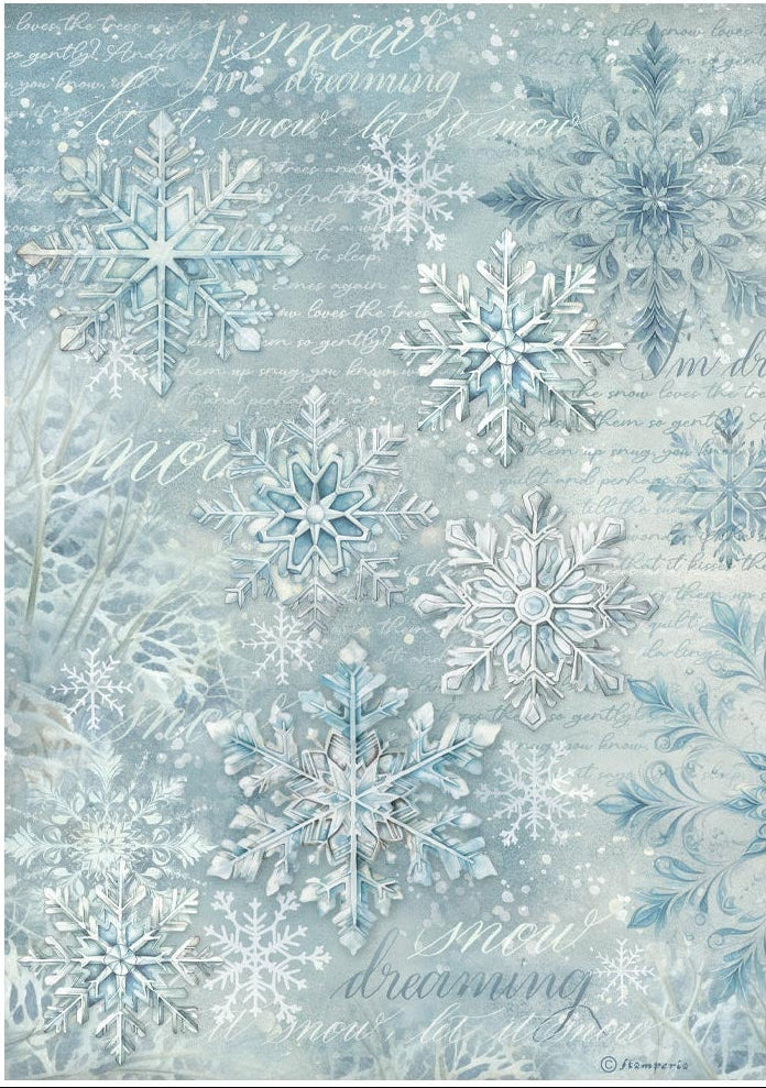 Patterned paper with snowflakes and text on a light blue background