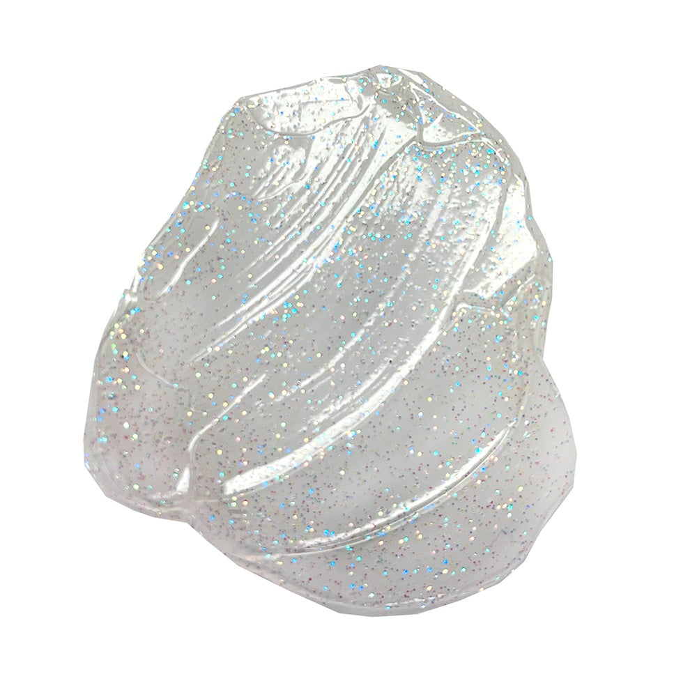 Clear gelatinous substance with glittery texture on a white background