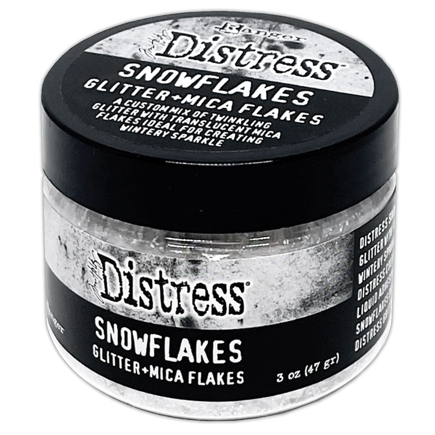 Jar of Ranger Distress Snowflakes Glitter + Mica Flakes on a white background