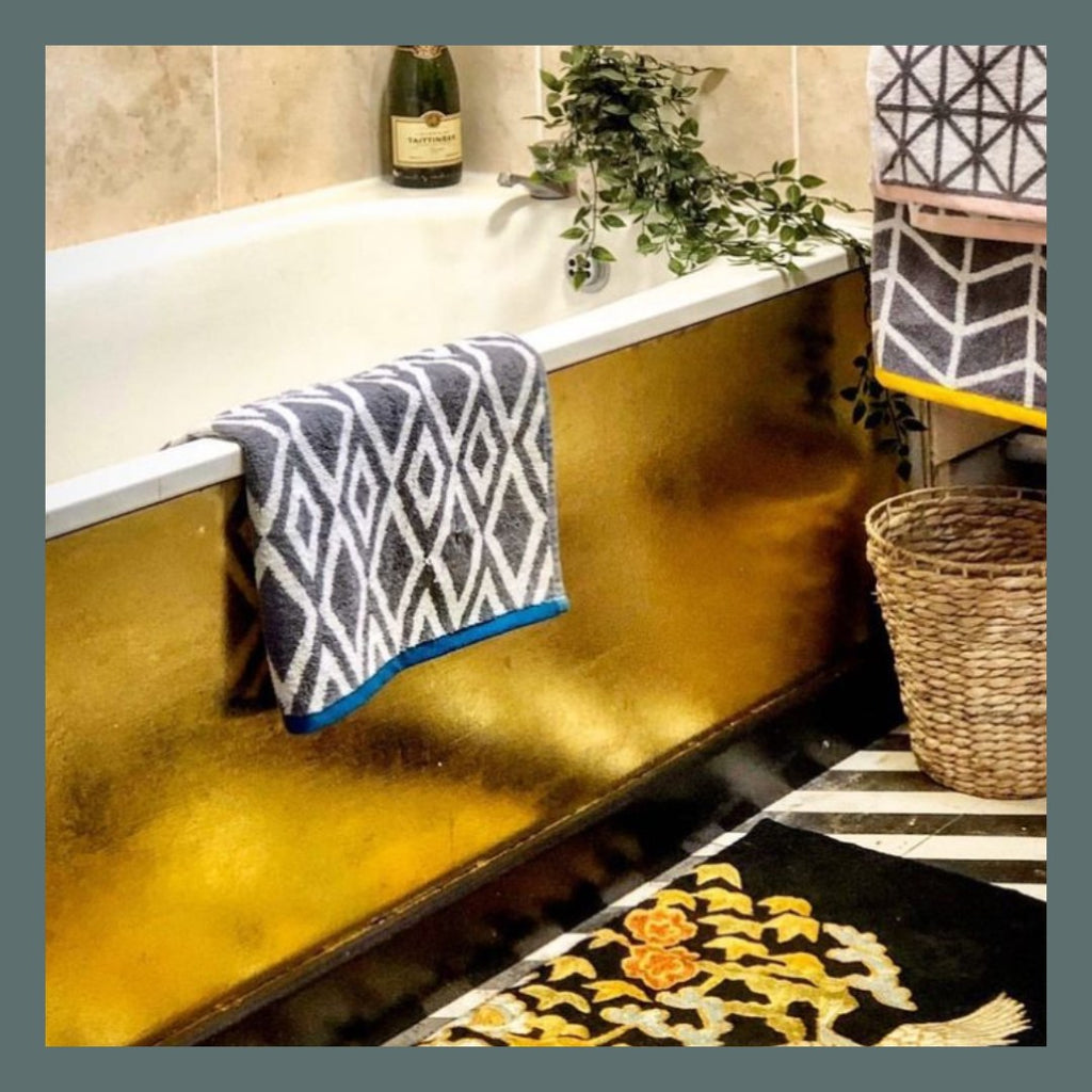 Bathtub gilded using Polyvine size adhesive formula and gold leaf