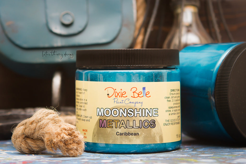 Dixie Belle Moonshine Metallics paint in the color Caribbean, a bright teal shade.