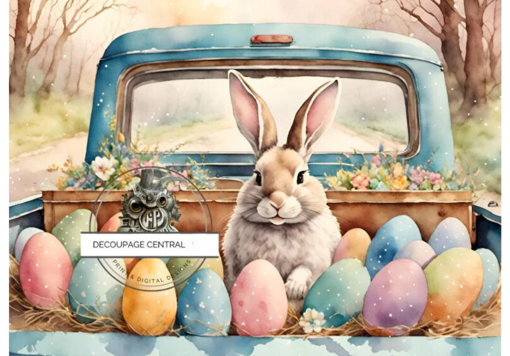 Large bunny in back of blue vintage truck with painted Easter eggs. Decoupage Central A4 Decoupage Paper for crafting.