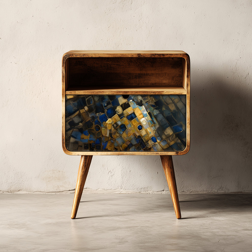 Wooden side table with abstract patterned glass panel against a plain wall.