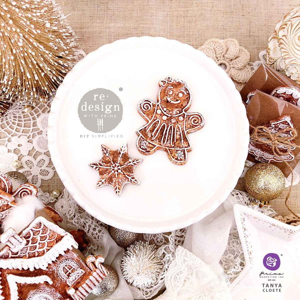 Redesign with Prima Festive Gingerbread Treats mold with 5 figures; star tree gingerbread dolls and house.