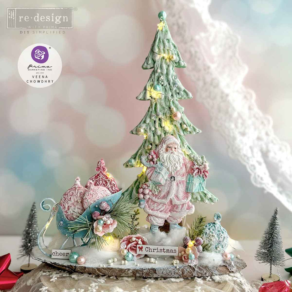 Redesign with Prima Holiday Greeting mold with 3 figures; Santas carrying greenery and presents