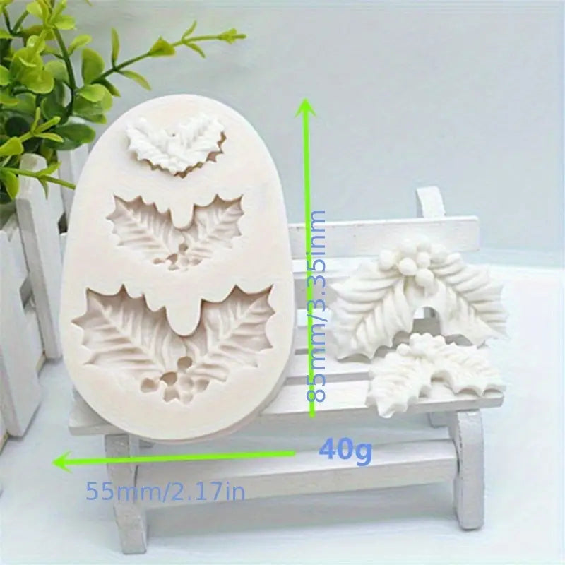 Silicone mold with leaf design on a white stand, with measurements indicated.