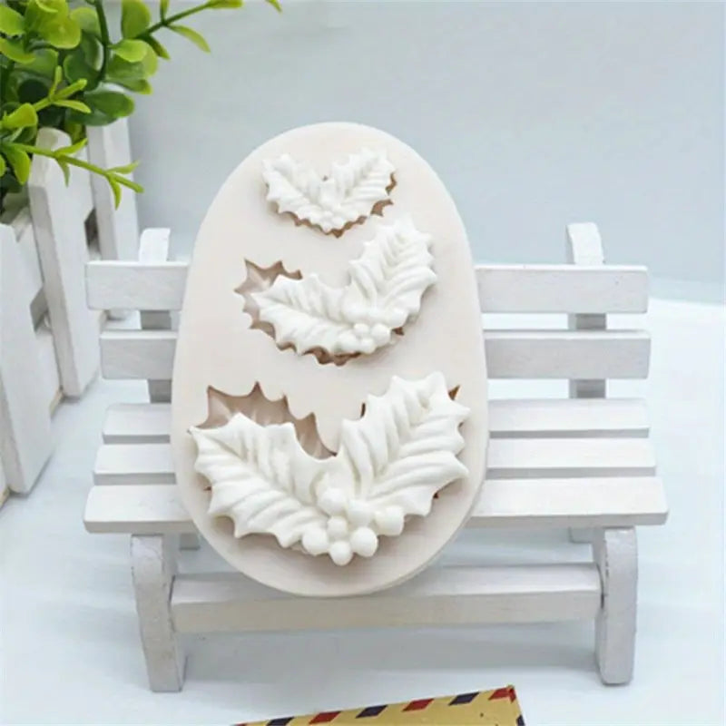 Decorative mold with leaf patterns on a white bench