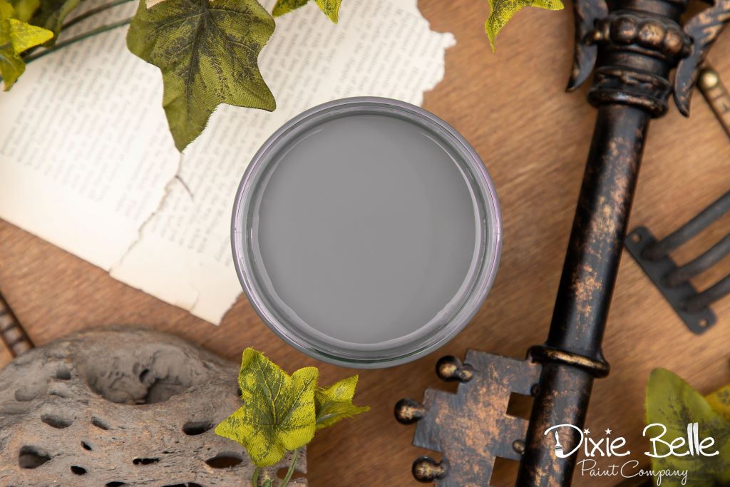 Jar of Dixie Belle chalk mineral paint in the color of Hurricane Gray