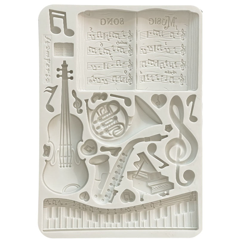 Gray Stamperia silicone mold with sheet music instruments and music notes