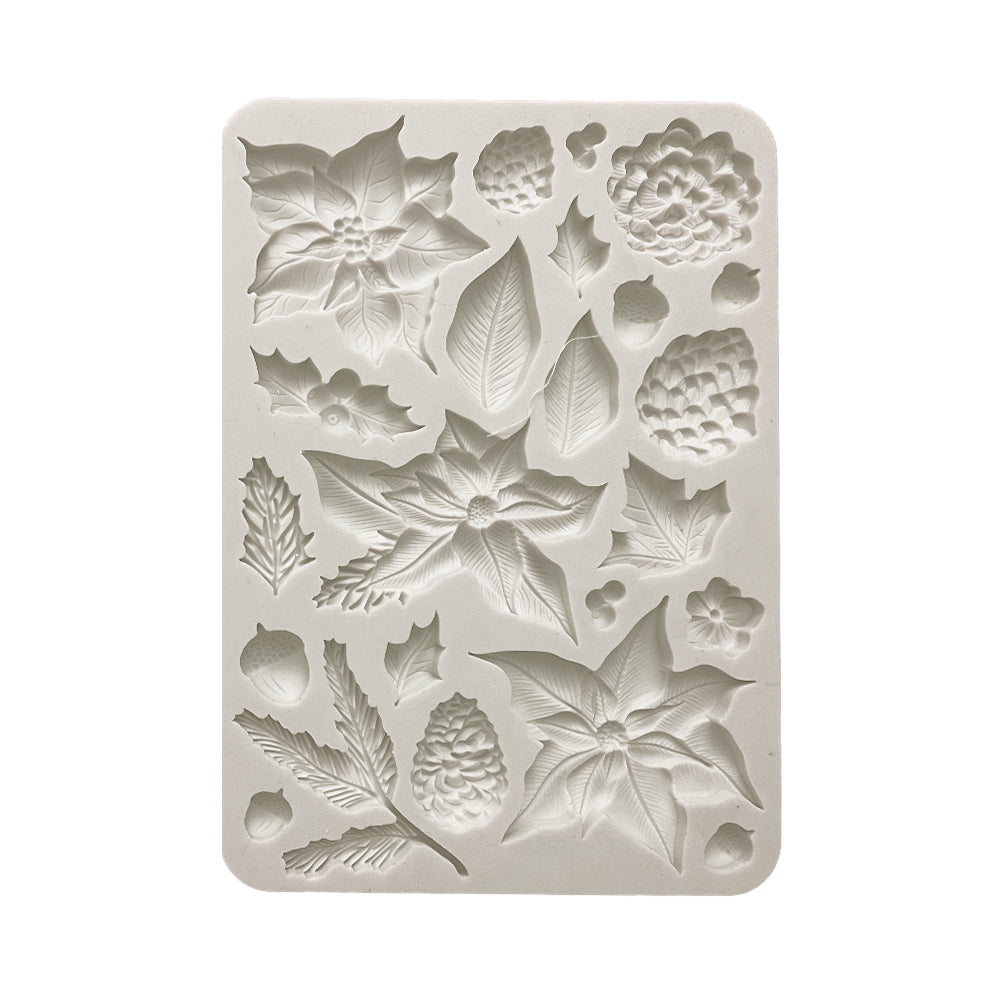 Gray Stamperia silicone mold with poinsettias pinecones greenery and acorns.