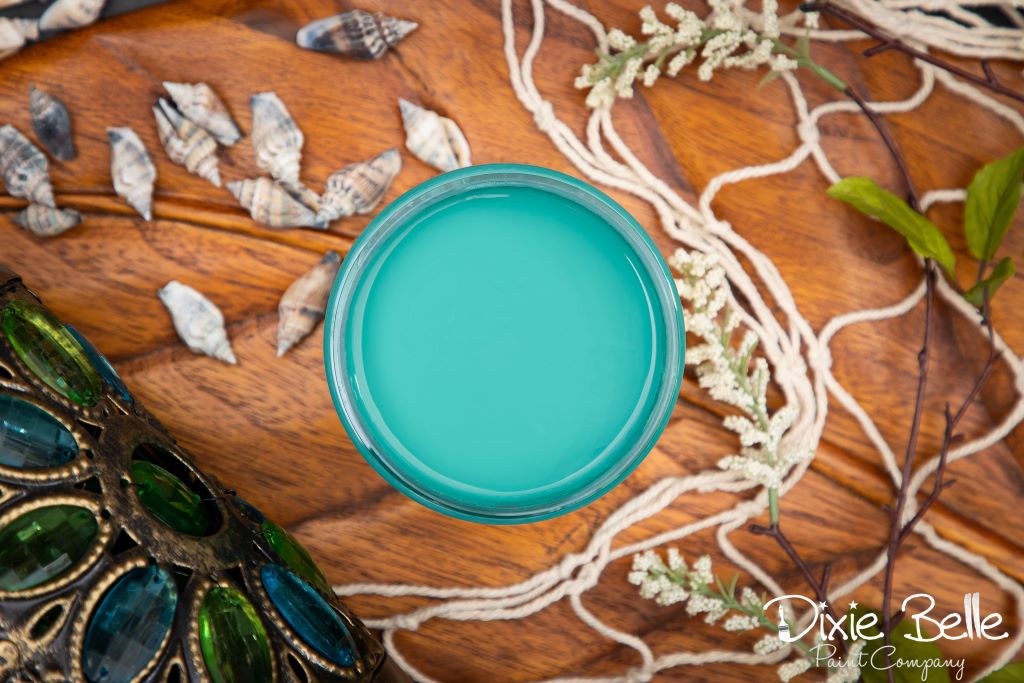 Jar of Dixie Belle chalk mineral paint in the color of mermaid Tail Green