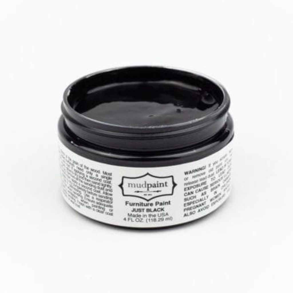 Just Black Clay paint by Mudpaint. Colored paint in 4 oz jar