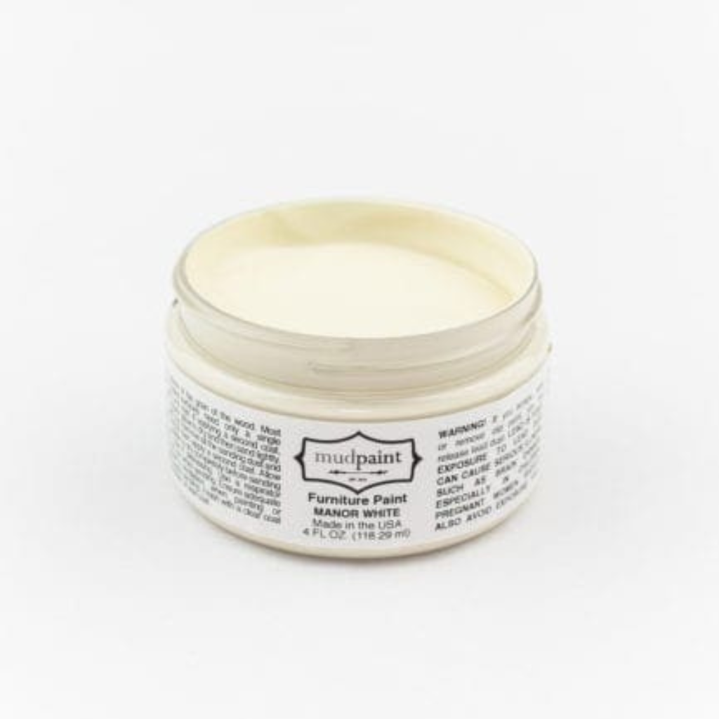 Soft eggshell white Manor White Clay paint by Mudpaint. Colored paint in 4 oz jar