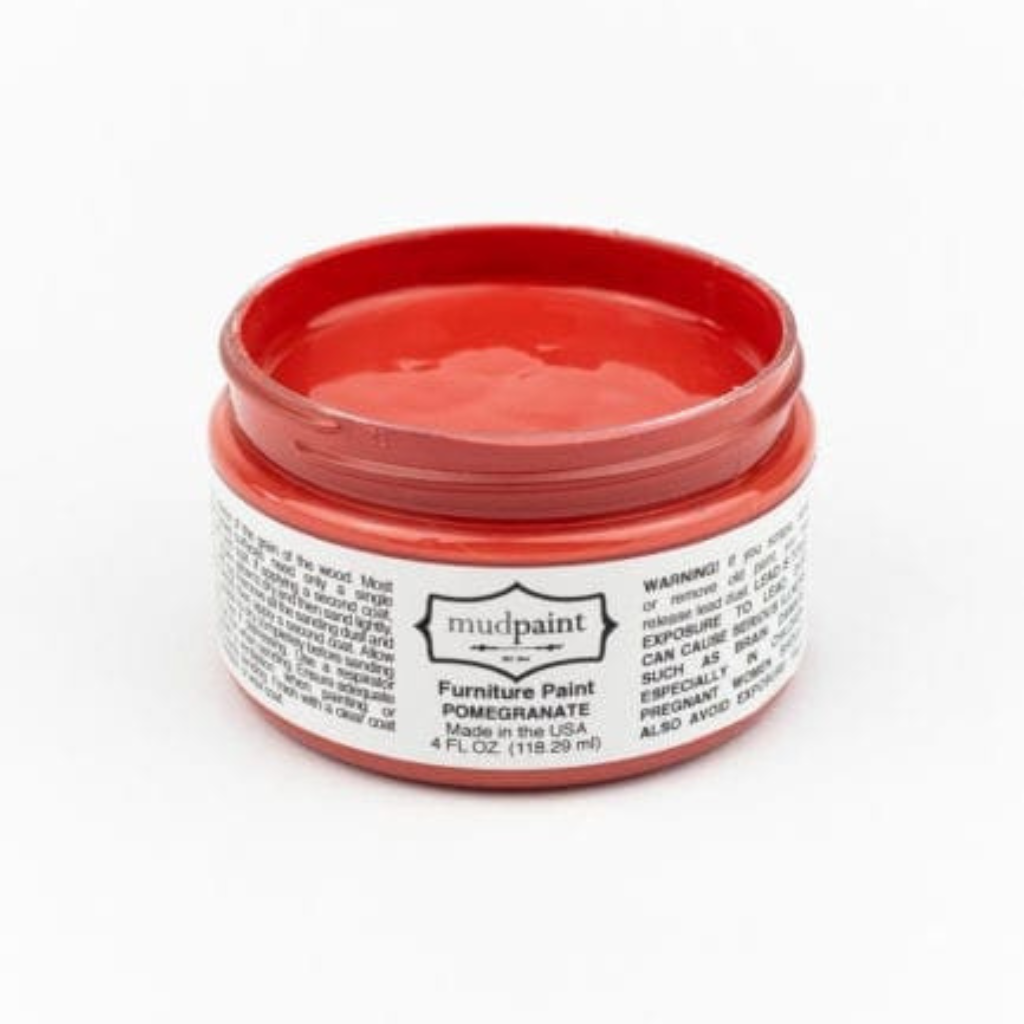 Bright red PomegranateClay paint by Mudpaint. Colored paint in 4 oz jar