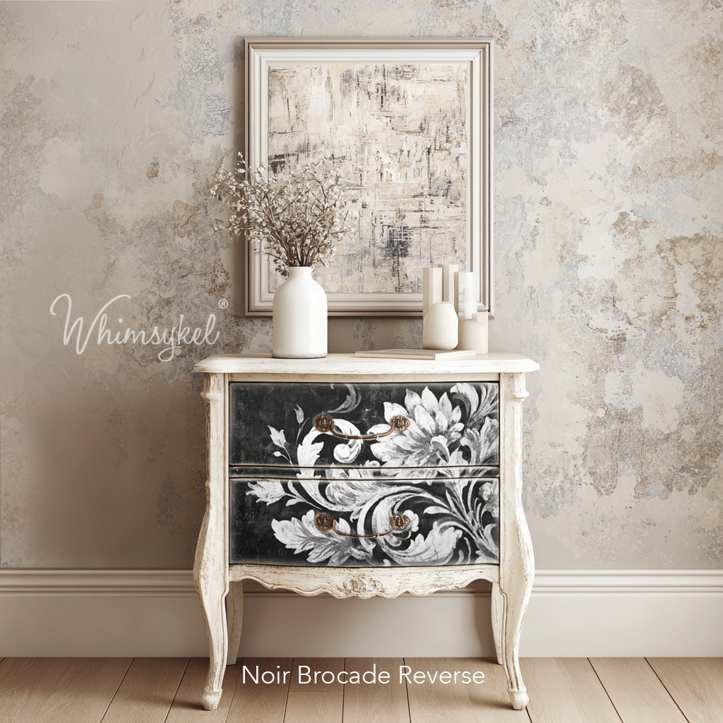 Decorative cabinet with floral design in a room with framed artwork and vases.