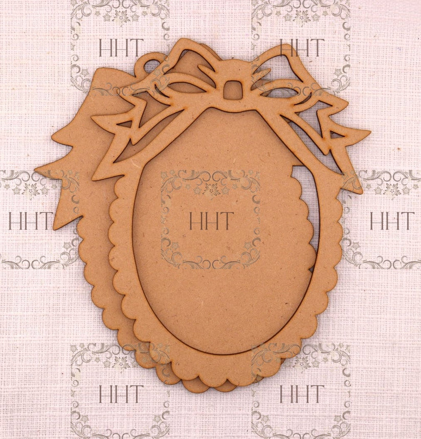 Handcrafted Holiday Traditions Ornament with Overlay Bow Frame MDF 2 piece brown wood shape.