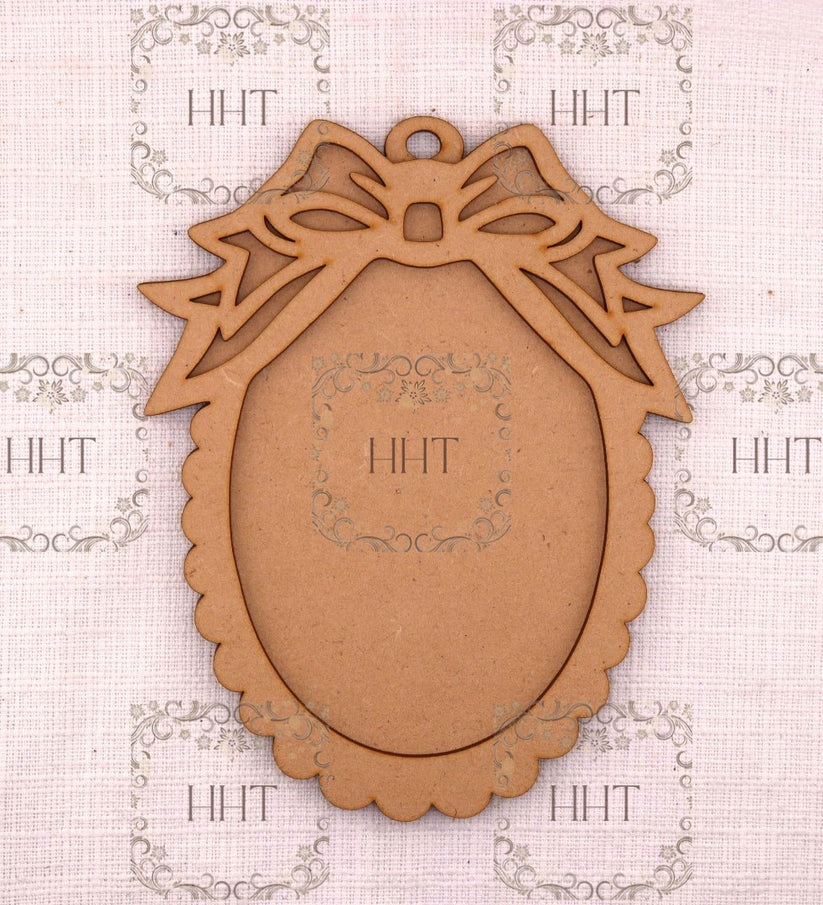 Handcrafted Holiday Traditions Ornament with Overlay Bow Frame MDF 2 piece brown wood shape.