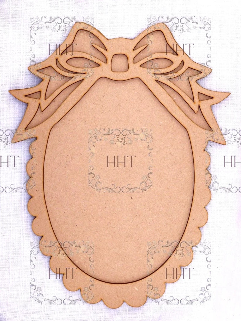 Handcrafted Holiday Traditions Plaque with Overlay Bow Frame MDF 2 piece brown wood shape.