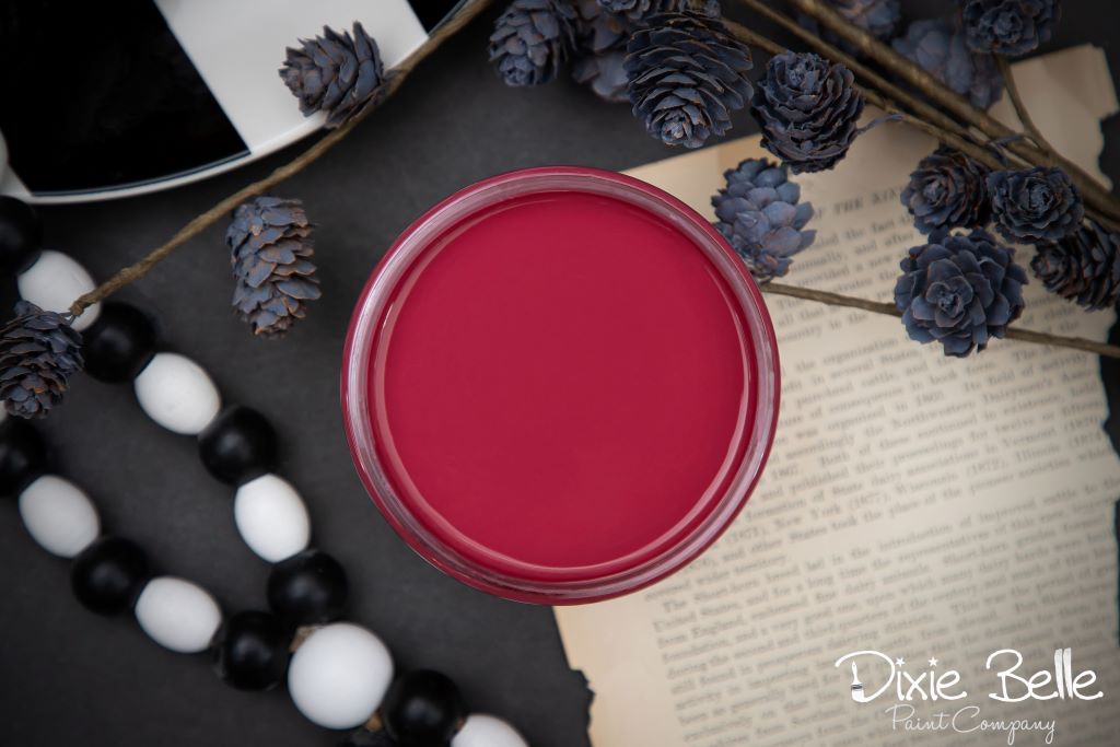 Jar of Dixie Belle chalk mineral paint in the color of Plum Crazy purple