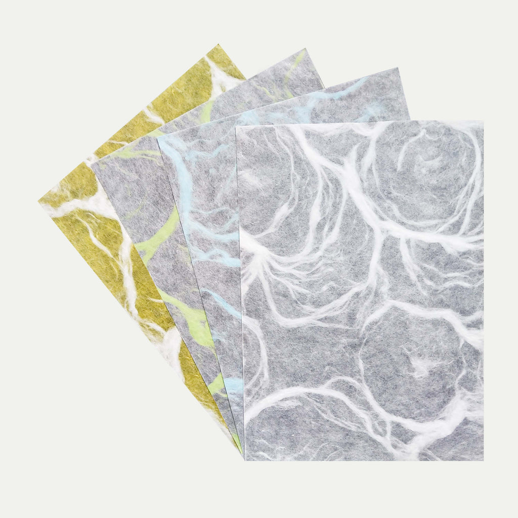 collection of rippled decoupage rice paper from Kozo in white, gray and yellow