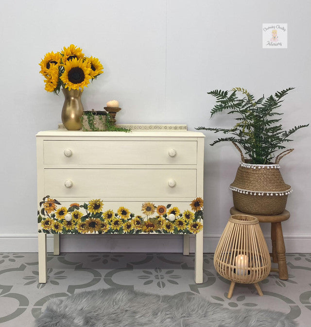 light yellow Sunkissed Silk Paint from Dixie Belle on dresser with sunflower transfers